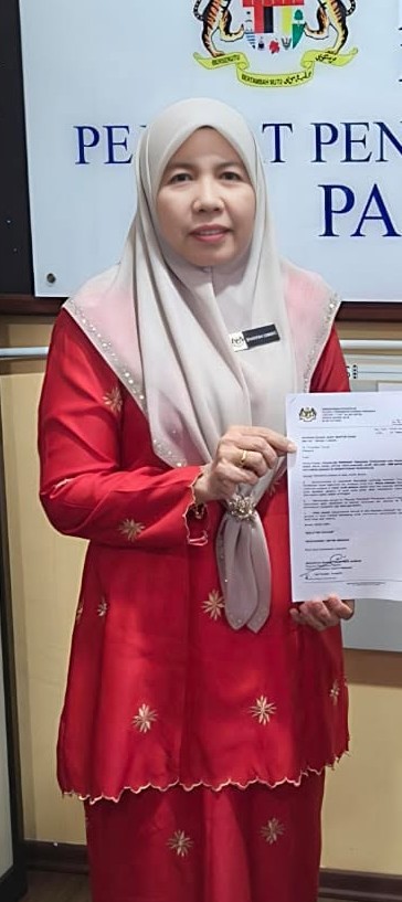 Puan Sharifah Idawati binti Wan Ahmad